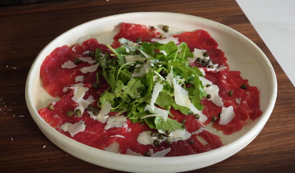 Карпаччо з мармурової яловичини Карпаччо з мармурової яловичини